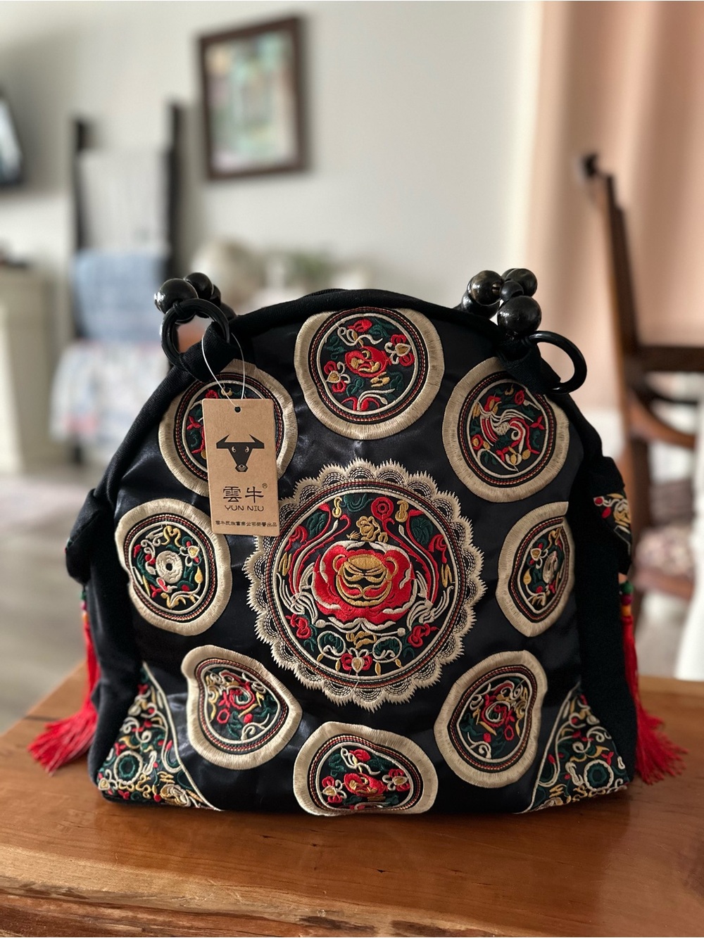 Yun Niu Black Embroidered Circle-Motif Hand Bag/ Tote